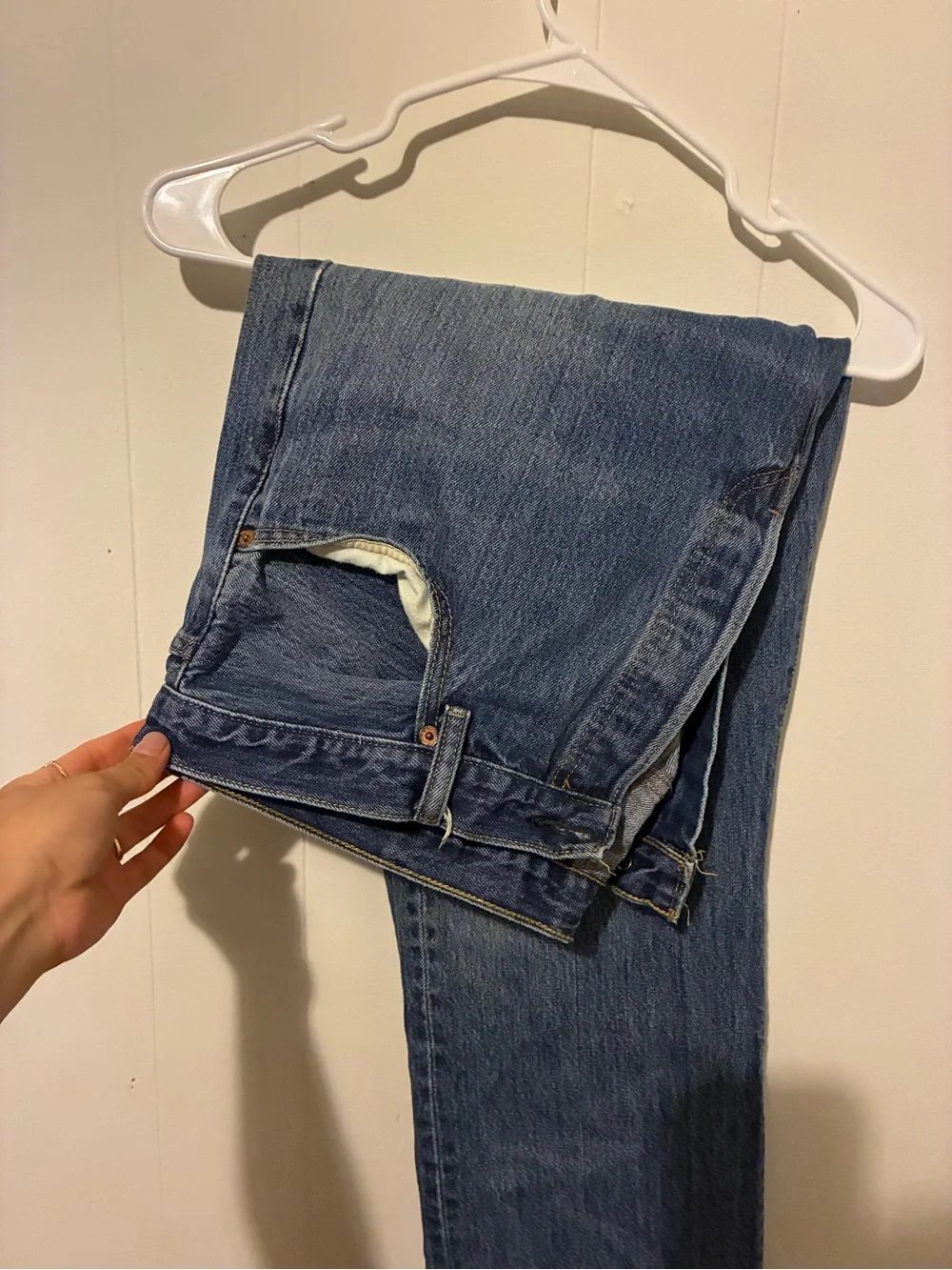 Levi's blue denim jeans with tan leather patch
